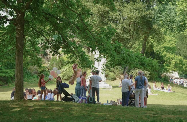 Family celebrating birthday in a park